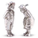 A PAIR OF CONTINENTAL CAST SILVER NOVELTY PEPPERS