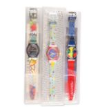 THREE ASSORTED SWATCH WATCHES