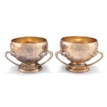 A PAIR OF GEORGE V SILVER-GILT SMALL TYGS