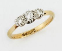 A THREE STONE DIAMOND RING