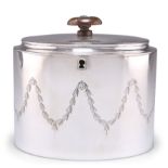 A GEORGE III SILVER TEA CADDY