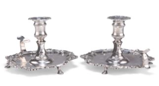 A PAIR OF GEORGE II SILVER CHAMBERSTICKS