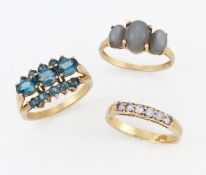 THREE 9 CARAT GOLD GEM-SET RINGS