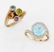 TWO 9 CARAT GOLD GEM-SET RINGS