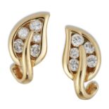 A PAIR OF DIAMOND STUD EARRINGS