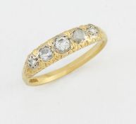 AN 18 CARAT GOLD DIAMOND FIVE STONE RING