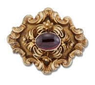 A CARBUNCLE GARNET BROOCH