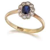 A SAPPHIRE AND DIAMOND CLUSTER RING