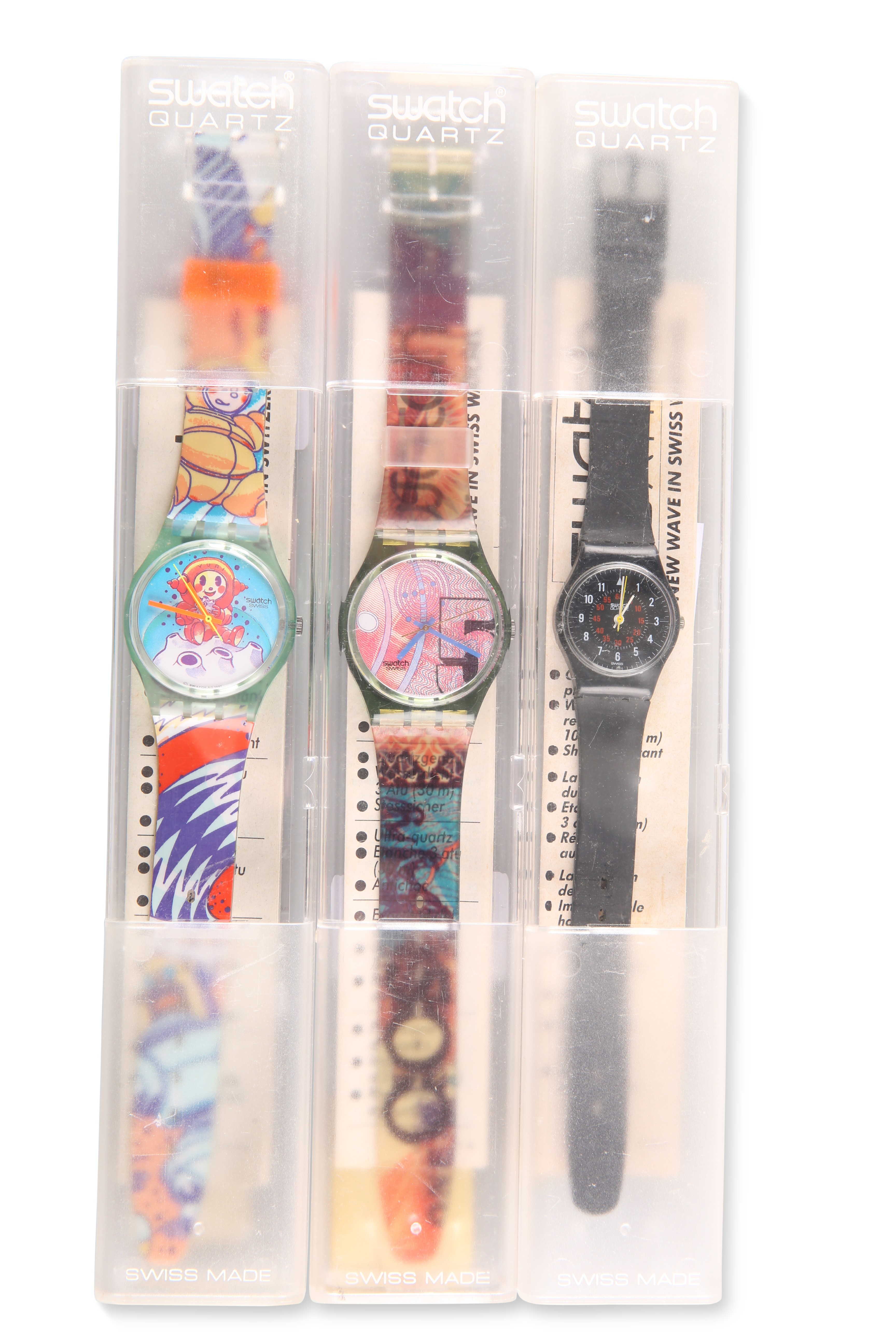 THREE SWATCH WATCHES