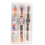 THREE SWATCH WATCHES