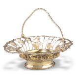 A GEORGE III SILVER-GILT PIERCED BASKET