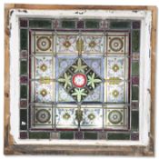 AN ARTS AND CRAFTS LEADED AND STAINED GLASS WINDOW