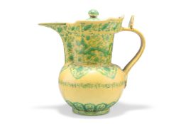 A CHINESE MING-STYLE YELLOW-GLAZED 'MONKS CAP' EWER