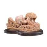 A CHINESE SOAPSTONE 'LANDSCAPE' CARVING, 19TH CENTURY