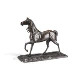 A PATINATED BRONZE MODEL OF A HORSE