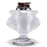 LALIQUE, A 'TÊTE DE LION' TABLE LIGHTER AND MATCHING ASHTRAY