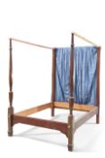 A REGENCY-STYLE MAHOGANY FOUR-POSTER BED