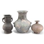 A GROUP OF THREE VASES/VESSELS