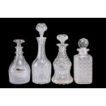 A GROUP OF FOUR GEORGIAN AND LATER GLASS DECANTERS