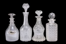 A GROUP OF FOUR GEORGIAN AND LATER GLASS DECANTERS