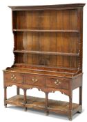 AN 18TH CENTURY OAK DRESSER AND RACK