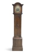 AN EARLY 20TH CENTURY OAK THREE-TRAIN GRANDMOTHER CLOCK