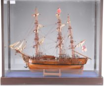 A WOODEN SCALE MODEL OF HMS BOUNTY