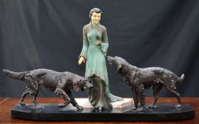 AN ART DECO-STYLE SPELTER AND IVORINE GROUP