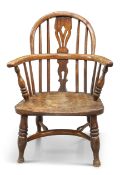 A 19TH CENTURY ELM AND OAK CHILD'S WINDSOR CHAIR