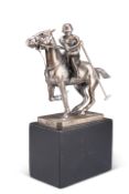 A CHROME-PLATED FIGURE OF A POLO PLAYER ON HORSEBACK