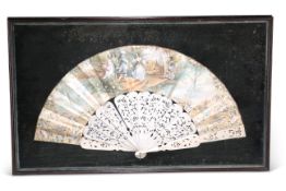 A FRENCH CARVED IVORY FAN, 19TH CENTURY