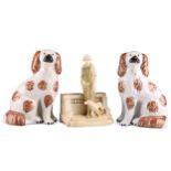 A TURN VIENNA FIGURAL VASE AND A PAIR OF STAFFORDSHIRE SPANIELS