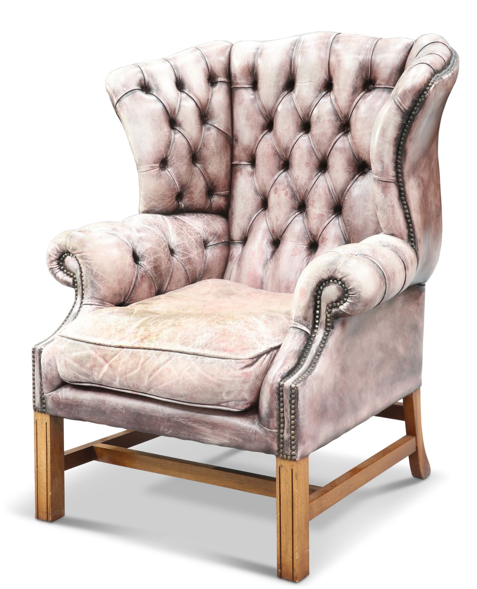 A GEORGIAN-STYLE LEATHER UPHOLSTERED WING-BACK ARMCHAIR