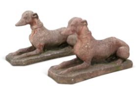 A PAIR OF COMPOSITE RECUMBENT GREYHOUNDS AND A COMPOSITE MODEL OF HEMERA