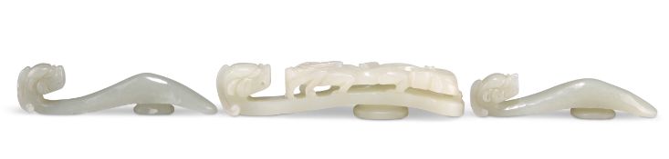 THREE CHINESE CARVED JADE BELT HOOKS