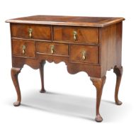 AN EARLY 18TH CENTURY WALNUT LOWBOY