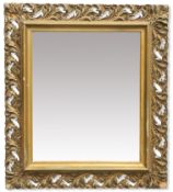 A VICTORIAN GILT-COMPOSITION MIRROR