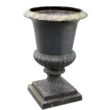 A LARGE CAST IRON CAMPANA URN