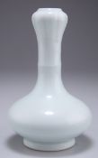 A CHINESE WHITE-GLAZED GARLIC-MOUTH VASE