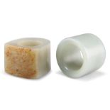 TWO CHINESE JADE ARCHERY THUMB RINGS