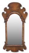 A GEORGE II-STYLE WALNUT FRETWORK MIRROR