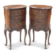 A PAIR OF LOUIS XV-STYLE CARVED CHESTS OF DRAWERS