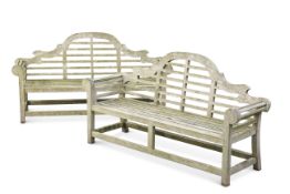 A PAIR OF TEAK LUTYENS-STYLE BENCHES