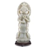 A CHINESE CARVED JADE FIGURE OF GUANYIN
