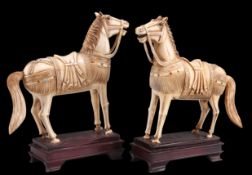 A PAIR OF CHINESE IVORY MODELS OF TANG HORSES, 19TH CENTURY