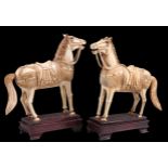 A PAIR OF CHINESE IVORY MODELS OF TANG HORSES, 19TH CENTURY