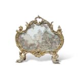 A 19TH CENTURY ROCOCO-STYLE GILT-METAL FIRESCREEN