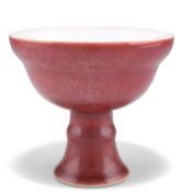 A CHINESE SANG DE BOEUF STEM CUP