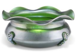 AN ART NOUVEAU GREEN GLASS BOWL