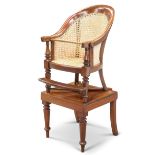 A VICTORIAN MAHOGANY AND CANEWORK BERGÈRE CHILD'S HIGHCHAIR ON STAND